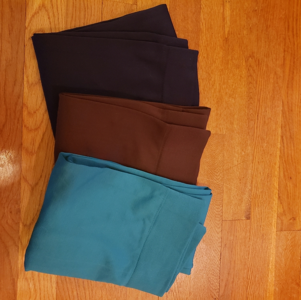 3 pairs fleece lined leggings. Navy, brown, teal. All like new. Boutique brand